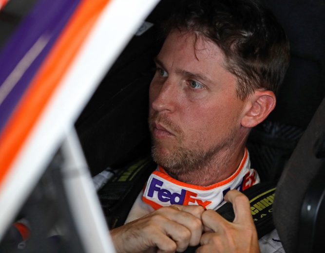 JOLIET, ILLINOIS - JUNE 29: Denny Hamlin, driver of the #11 FedEx Express Toyota, gets ready to drive during practice for the Monster Energy NASCAR Cup Series Camping World 400 at Chicagoland Speedway on June 29, 2019 in Joliet, Illinois. (Photo by Jonathan Daniel/Getty Images) | Getty Images