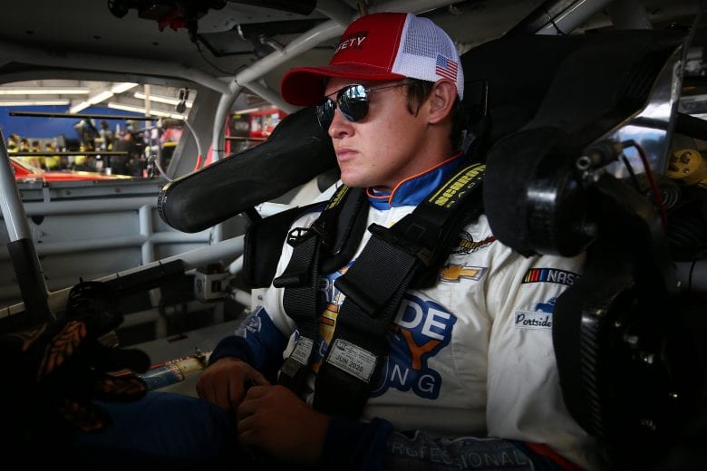 DAYTONA BEACH, FLORIDA - JULY 04: Gray Gaulding, driver of the #08 WorldWide Safety Consulting Services Chevrolet, gets into his car during practice for the NASCAR Xfinity Series Circle K Firecracker 250 Powered by Coca-Cola at Daytona International Speedway on July 04, 2019 in Daytona Beach, Florida. (Photo by Matt Sullivan/Getty Images) | Getty Images