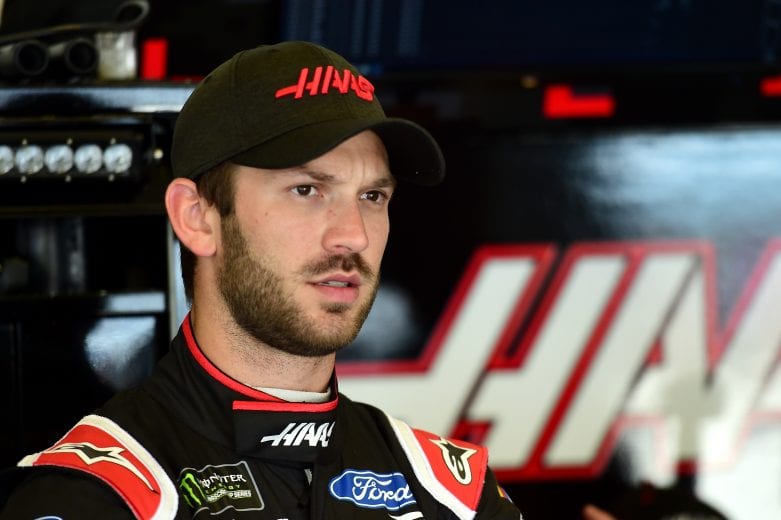 DAYTONA BEACH, FLORIDA - JULY 04: Daniel Suarez, driver of the #41 Haas Automation Ford, stands in the garage area during practice for the Monster Energy NASCAR Cup Series Coke Zero Sugar 400 at Daytona International Speedway on July 04, 2019 in Daytona Beach, Florida. (Photo by Jared C. Tilton/Getty Images) | Getty Images