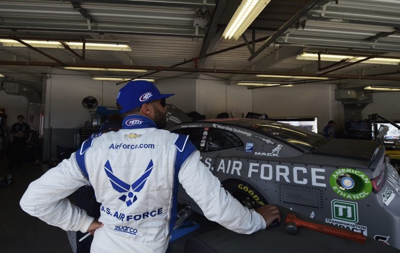 DAYTONA BEACH, FLORIDA - JULY 04: Bubba Wallace, driver of the #43 United States Air Force Chevrolet, looks on from the garage during practice for the Monster Energy NASCAR Cup Series Coke Zero Sugar 400 at Daytona International Speedway on July 04, 2019 in Daytona Beach, Florida. (Photo by Jeff Curry/Getty Images) | Getty Images
