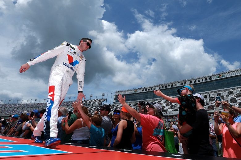 DAYTONA BEACH, FLORIDA - JULY 07: Alex Bowman, driver of the #88 Valvoline Patriotic Chevrolet, greets fans during pre-race ceremonies during the Monster Energy NASCAR Cup Series Coke Zero Sugar 400 at Daytona International Speedway on July 07, 2019 in Daytona Beach, Florida. (Photo by Sean Gardner/Getty Images) | Getty Images