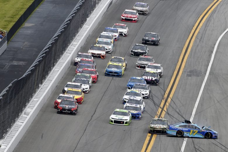DAYTONA BEACH, FLORIDA - JULY 07: Ricky Stenhouse Jr., driver of the #17 Fifth Third Bank Ford, is involved in an on-track incident during the Monster Energy NASCAR Cup Series Coke Zero Sugar 400 at Daytona International Speedway on July 07, 2019 in Daytona Beach, Florida. (Photo by Brian Lawdermilk/Getty Images) | Getty Images