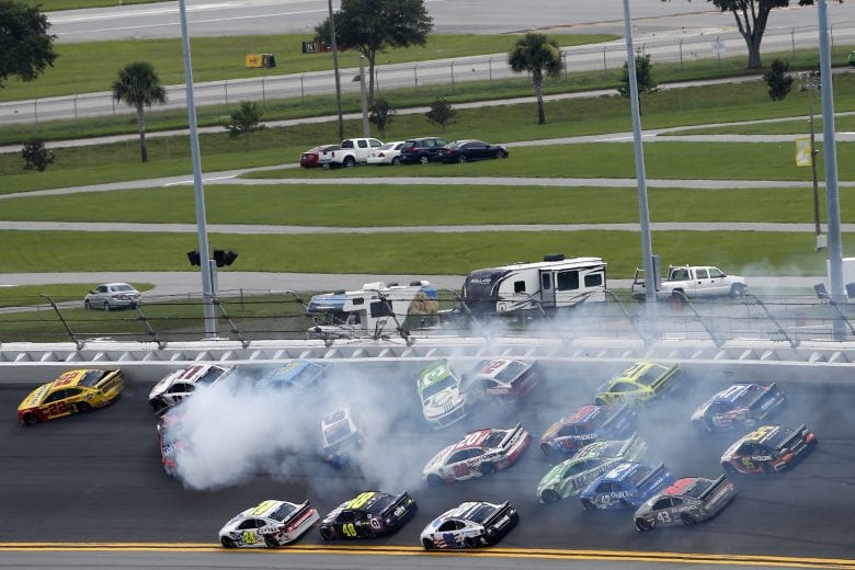 DAYTONA BEACH, FLORIDA - JULY 07: Austin Dillon, driver of the #3 American Ethanol Chevrolet, and Clint Bowyer, driver of the #14 Mobil 1/Rush Truck Centers Ford, start an on-track incident during the Monster Energy NASCAR Cup Series Coke Zero Sugar 400 at Daytona International Speedway on July 07, 2019 in Daytona Beach, Florida. (Photo by Brian Lawdermilk/Getty Images) | Getty Images