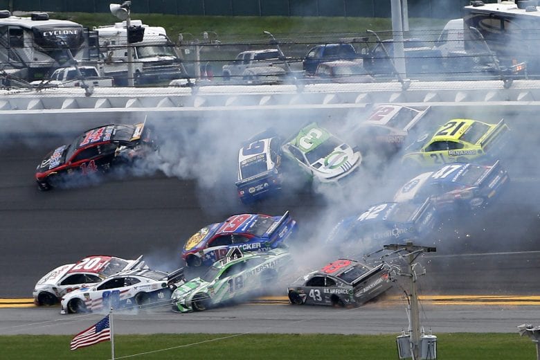 DAYTONA BEACH, FLORIDA - JULY 07: Austin Dillon, driver of the #3 American Ethanol Chevrolet, and Clint Bowyer, driver of the #14 Mobil 1/Rush Truck Centers Ford, start an on-track incident during the Monster Energy NASCAR Cup Series Coke Zero Sugar 400 at Daytona International Speedway on July 07, 2019 in Daytona Beach, Florida. (Photo by Brian Lawdermilk/Getty Images) | Getty Images