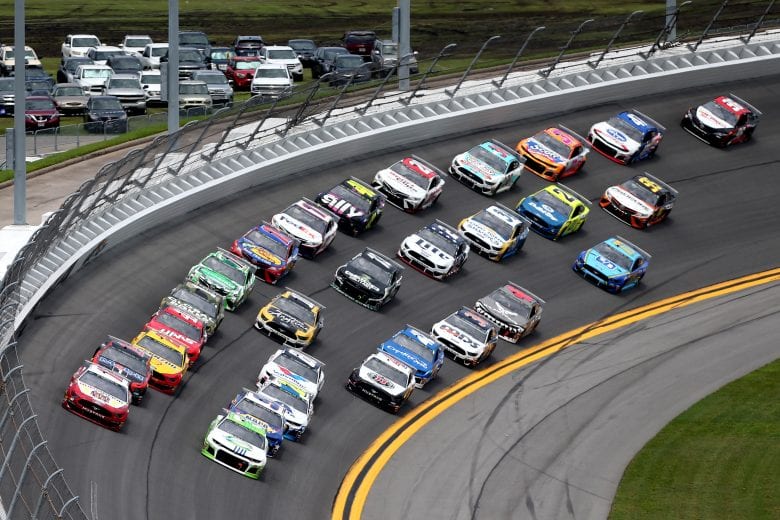 DAYTONA BEACH, FLORIDA - JULY 07: Ryan Blaney, driver of the #12 BodyArmor Ford, and Austin Dillon, driver of the #3 American Ethanol Chevrolet, lead the field during the Monster Energy NASCAR Cup Series Coke Zero Sugar 400 at Daytona International Speedway on July 07, 2019 in Daytona Beach, Florida. (Photo by Matt Sullivan/Getty Images) | Getty Images