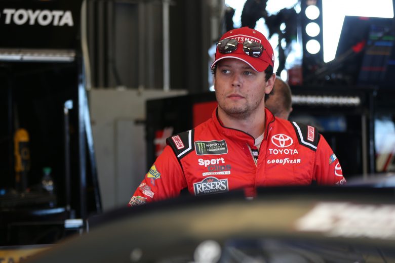SPARTA, KENTUCKY - JULY 12: Erik Jones, driver of the #20 Craftsman Toyota, stands by his car during practice for the Monster Energy NASCAR Cup Series Quaker State 400 Presented by Walmart at Kentucky Speedway on July 12, 2019 in Sparta, Kentucky. (Photo by Matt Sullivan/Getty Images) | Getty Images