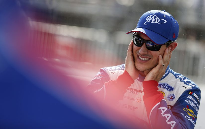 LOUDON, NEW HAMPSHIRE - JULY 19: Joey Logano, driver of the #22 AAA Insurance Ford, stands on the grid during qualifying for the Monster Energy NASCAR Cup Series Foxwoods Resort Casino 301 at New Hampshire Motor Speedway on July 19, 2019 in Loudon, New Hampshire. (Photo by Brian Lawdermilk/Getty Images) | Getty Images