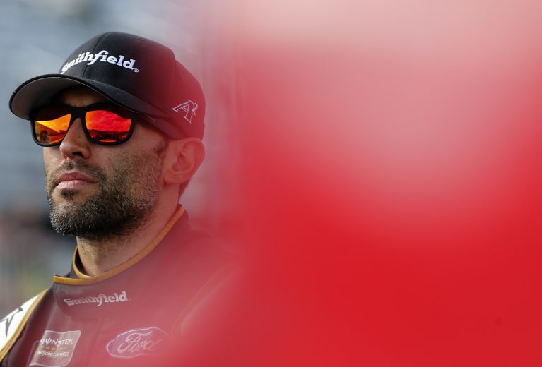 LOUDON, NEW HAMPSHIRE - JULY 19: Aric Almirola, driver of the #10 Smithfield Ford, looks on during qualifying for the Monster Energy NASCAR Cup Series Foxwoods Resort Casino 301 at New Hampshire Motor Speedway on July 19, 2019 in Loudon, New Hampshire. (Photo by Brian Lawdermilk/Getty Images) | Getty Images