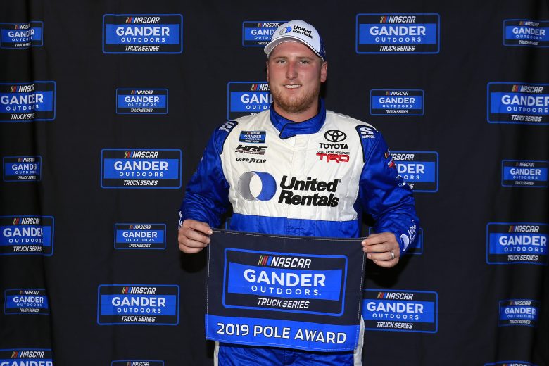 LONG POND, PENNSYLVANIA - JULY 26: Austin Hill, driver of the #16 United Rentals Toyota, poses with the pole award after posting the quickest lap during qualifying for the NASCAR Gander Outdoors Truck Series Gander RV 150 at Pocono Raceway on July 26, 2019 in Long Pond, Pennsylvania. (Photo by Chris Trotman/Getty Images) | Getty Images
