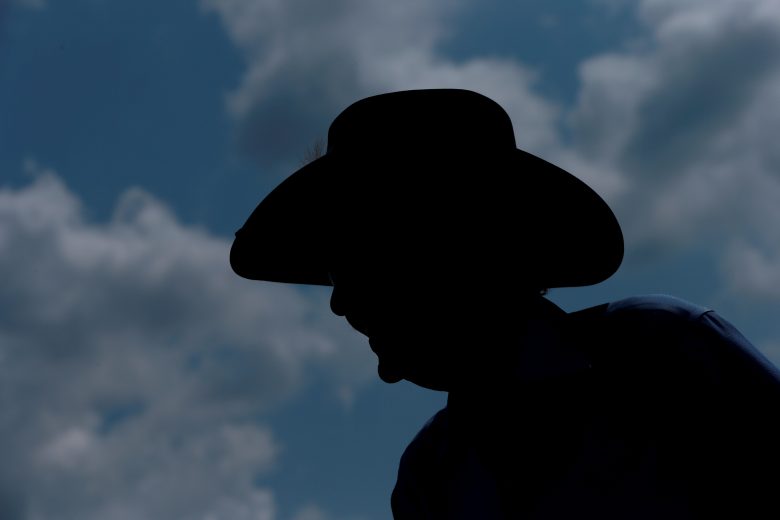 LONG POND, PENNSYLVANIA - JULY 27: Richard Petty walks through the garage during practice for the Monster Energy NASCAR Cup Series Gander RV 400 at Pocono Raceway on July 27, 2019 in Long Pond, Pennsylvania. (Photo by Sean Gardner/Getty Images) | Getty Images