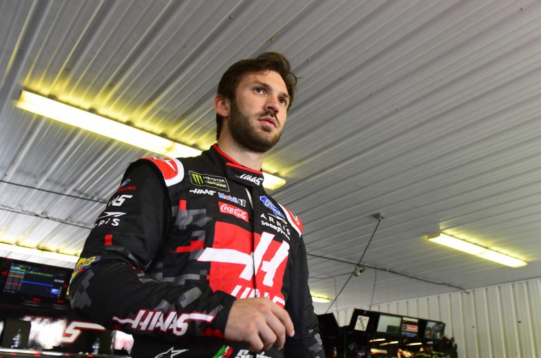 LONG POND, PENNSYLVANIA - JULY 27: Daniel Suarez, driver of the #41 Haas Automation Ford, stands in the garage area during practice for the Monster Energy NASCAR Cup Series Gander RV 400 at Pocono Raceway on July 27, 2019 in Long Pond, Pennsylvania. (Photo by Jared C. Tilton/Getty Images) | Getty Images