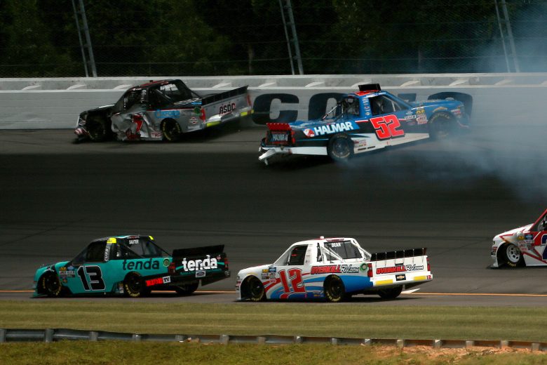 LONG POND, PENNSYLVANIA - JULY 27: Stewart Friesen, driver of the #52 Halmar International Chevrolet, is involved in an on track incident during the NASCAR Gander Outdoors Truck Series Gander RV 150 at Pocono Raceway on July 27, 2019 in Long Pond, Pennsylvania. (Photo by Sean Gardner/Getty Images) | Getty Images