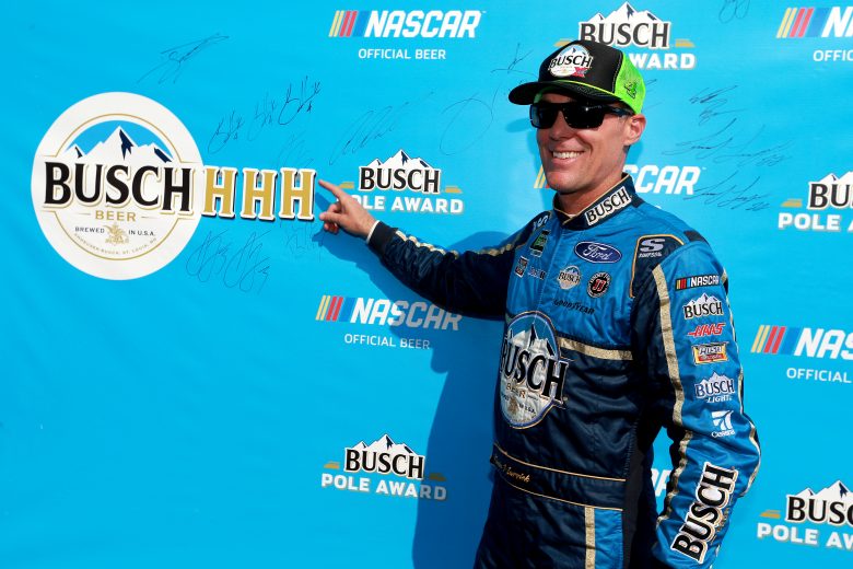 LONG POND, PENNSYLVANIA - JULY 27: Kevin Harvick, driver of the #4 Busch Beer Gen X Ford, celebrates with the Busch Pole Award after qualifying for the Monster Energy NASCAR Cup Series Gander RV 400 at Pocono Raceway on July 27, 2019 in Long Pond, Pennsylvania. (Photo by Sean Gardner/Getty Images) | Getty Images