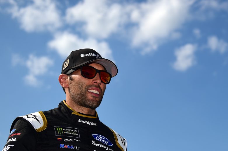 LONG POND, PENNSYLVANIA - JULY 27: Aric Almirola, driver of the #10 Smithfield Ford, walks on the grid during qualifying for the Monster Energy NASCAR Cup Series Gander RV 400 at Pocono Raceway on July 27, 2019 in Long Pond, Pennsylvania. (Photo by Jared C. Tilton/Getty Images) | Getty Images