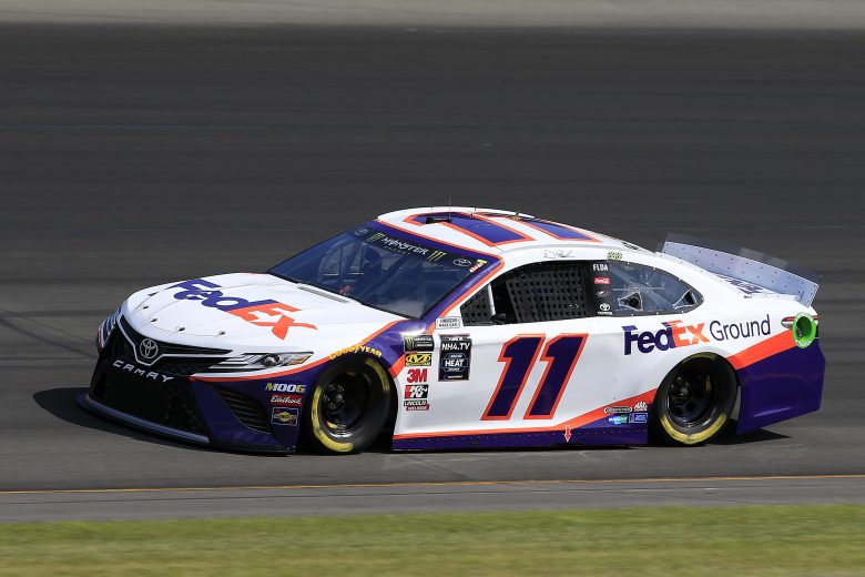 LONG POND, PENNSYLVANIA - JULY 27: Denny Hamlin, driver of the #11 FedEx Ground Toyota, qualifies for the Monster Energy NASCAR Cup Series Gander RV 400 at Pocono Raceway on July 27, 2019 in Long Pond, Pennsylvania. (Photo by Chris Trotman/Getty Images) | Getty Images