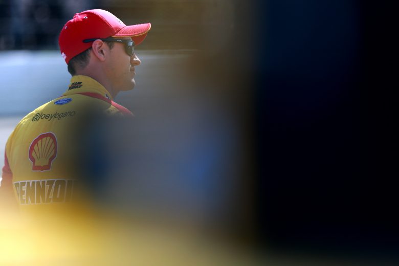 LONG POND, PENNSYLVANIA - JULY 27: Joey Logano, driver of the #22 Shell Pennzoil Ford, stands on pit road during qualifying for the Monster Energy NASCAR Cup Series Gander RV 400 at Pocono Raceway on July 27, 2019 in Long Pond, Pennsylvania. (Photo by Sean Gardner/Getty Images) | Getty Images