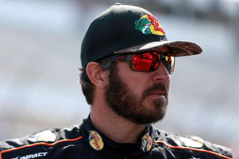 LONG POND, PENNSYLVANIA - JULY 27: Martin Truex Jr, driver of the #19 Bass Pro Shops/Tracker Off Road Toyota, looks on during qualifying for the Monster Energy NASCAR Cup Series Gander RV 400 at Pocono Raceway on July 27, 2019 in Long Pond, Pennsylvania. (Photo by Sean Gardner/Getty Images) | Getty Images