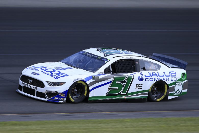 LONG POND, PENNSYLVANIA - JULY 27: BJ McLeod, driver of the #51 JACOB COMPANIES/Pocono Organics Ford, qualifies for the Monster Energy NASCAR Cup Series Gander RV 400 at Pocono Raceway on July 27, 2019 in Long Pond, Pennsylvania. (Photo by Chris Trotman/Getty Images) | Getty Images