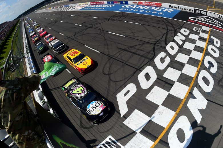 LONG POND, PENNSYLVANIA - JULY 28: Kevin Harvick, driver of the #4 Busch Beer Gen X Ford, leads the field during start of the Monster Energy NASCAR Cup Series Gander RV 400 at Pocono Raceway on July 28, 2019 in Long Pond, Pennsylvania. (Photo by Jared C. Tilton/Getty Images) | Getty Images
