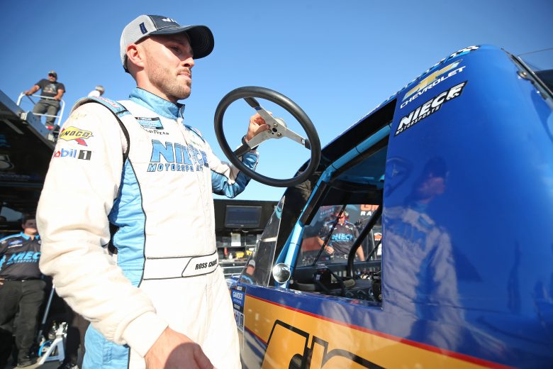 ROSSBURG, OHIO - JULY 31: Ross Chastain, driver of the #45 Niece/Jack Hewitt Tribute Chevrolet, gets into his truck during practice for the NASCAR Gander Outdoor Truck Series Eldora Dirt Derby at Eldora Speedway on July 31, 2019 in Rossburg, Ohio. (Photo by Matt Sullivan/Getty Images) | Getty Images