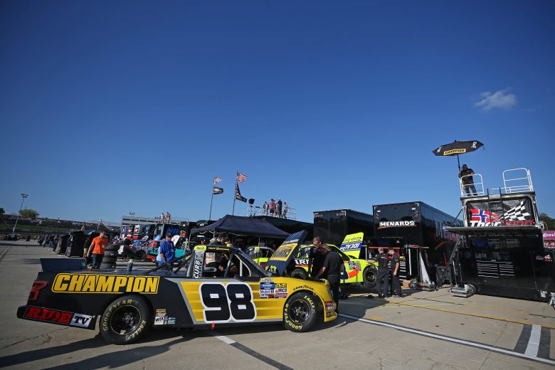 ROSSBURG, OHIO - JULY 31: Grant Enfinger, driver of the #98 Champion Power Equipment Ford, pulls out of the garage area during practice for the NASCAR Gander Outdoor Truck Series Eldora Dirt Derby at Eldora Speedway on July 31, 2019 in Rossburg, Ohio. (Photo by Matt Sullivan/Getty Images) | Getty Images