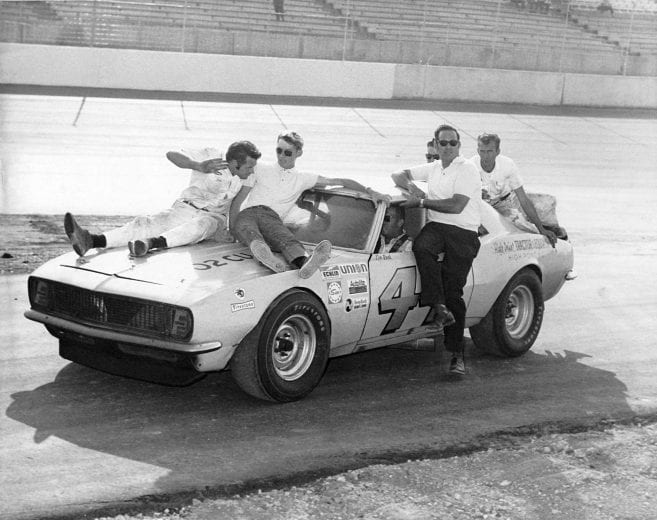 TALLADEGA, AL — September 13, 1969: Ken Rush gives his crew a ride to victory lane at the new Alabama International Motor Speedway after winning the Bama 400 NASCAR Grand American race, the first event to be run at the 2.66-mile Talladega facility. (Photo by ISC Images & Archives via Getty Images)