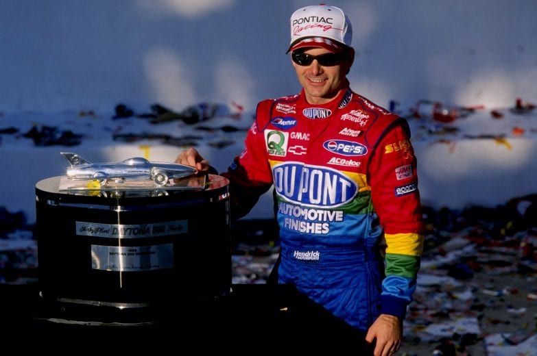 14 Feb 1999:   Jeff Gordon #24 stands with his trophy after winning the Daytona 500  at the Daytona International Speedway in Daytona, Florida. Mandatory Credit: Jamie Squire  /Allsport