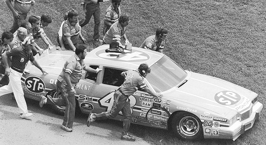 DAYTONA BEACH, FL - JULY 4, 1984: Richard Petty rides his jubilant crew to victory lane after recording his 200th career victory in the 1984 Firecracker 400 at Daytona. (Photo by ISC Archives via Getty Images)