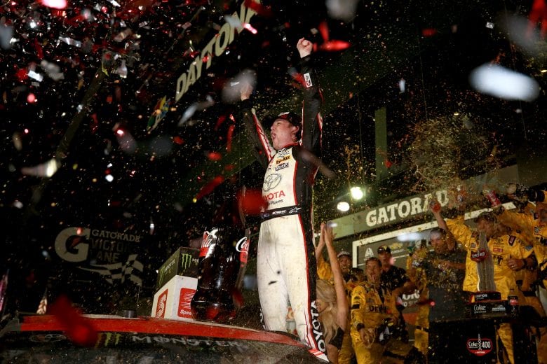 DAYTONA BEACH, FL - JULY 07: Erik Jones, driver of the #20 buyatoyota.com Toyota, celebrates in Victory Lane after winning the Monster Energy NASCAR Cup Series Coke Zero Sugar 400 at Daytona International Speedway on July 7, 2018 in Daytona Beach, Florida. (Photo by Matt Sullivan/Getty Images) | Getty Images