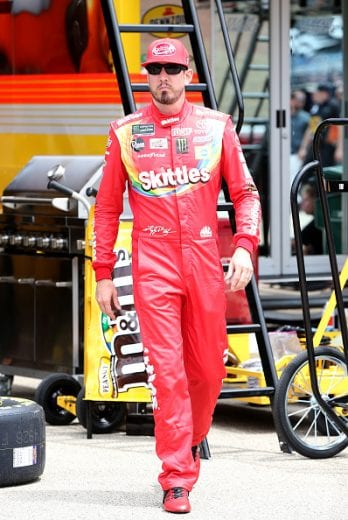 JOLIET, ILLINOIS - JUNE 29: Kyle Busch, driver of the #18 Skittles Red White & Blue Toyota, walks to his car during practice for the Monster Energy NASCAR Cup Series Camping World 400 at Chicagoland Speedway on June 29, 2019 in Joliet, Illinois. (Photo by Matt Sullivan/Getty Images) | Getty Images