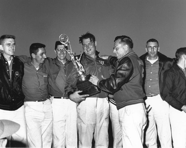 DAYTONA BEACH, FL - FEBRUARY 24, 1963:  Driver Tiny Lund and the Wood Brothers celebrate their win in the Daytona 500 at Daytona International Speedway. Lund was chosen to take the place of the WoodsÕ regular driver, Marvin Panch, after he helped free Panch from his burning, overturned sports car when he crashed earlier in the month during practice for the Daytona Continental, saving PanchÕs life. (Photo by ISC Images & Archives via Getty Images)