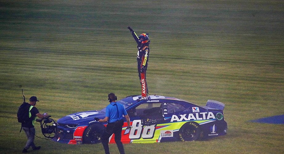 JOLIET, ILLINOIS - JUNE 30: Alex Bowman, driver of the #88 Axalta Chevrolet, waves to the crowd after winning after winning the Monster Energy NASCAR Cup Series Camping World 400 at Chicagoland Speedway on June 30, 2019 in Joliet, Illinois. (Photo by Jonathan Daniel/Getty Images) | Getty Images