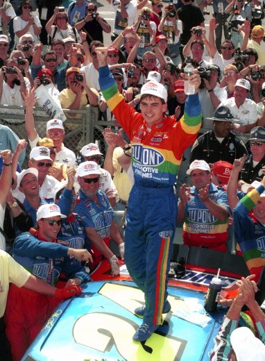 SPEEDWAY, IN - AUGUST 6:  Driver Jeff Gordon celebrates in Victory Lane after winning the Brickyard 400 race on August 6, 1994 at the Indianapolis Motor Speedway in Speedway, Indiana. (Photo by Dozier Mobley/Getty Images)