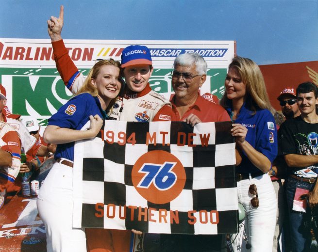 DARLINGTON, SC - SEPTEMBER 4, 1994:  Bill Elliott (L) and car owner Junior Johnson celebrate their win in the Mountain Dew Southern 500 NASCAR Cup race at Darlington Raceway. (Photo by ISC Images & Archives via Getty Images)