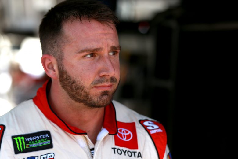 BRISTOL, TENNESSEE - AUGUST 16: Matt DiBenedetto, driver of the #95 Toyota Express Maintenance Toyota, stands in the garage during practice for the Monster Energy NASCAR Cup Series Bass Pro Shops NRA Night Race at Bristol Motor Speedway on August 16, 2019 in Bristol, Tennessee. (Photo by Sean Gardner/Getty Images) | Getty Images