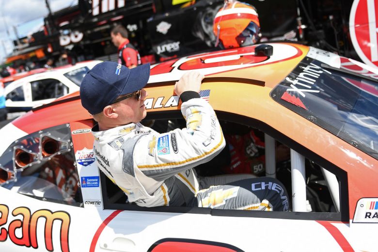 ELKHART LAKE, WISCONSIN - AUGUST 23:  Tyler Reddick, driver of the #2 Roland Chevrolet, gets into the car of Kaz Grala, driver of the #21 HotScream Chevrolet, during practice for the NASCAR Xfinity Series CTECH Manufacturing 180 at Road America on August 23, 2019 in Elkhart Lake, Wisconsin. (Photo by Stacy Revere/Getty Images) | Getty Images