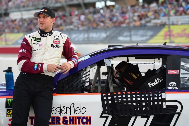 DARLINGTON, SC - SEPTEMBER 02: Denny Hamlin, driver of the #11 FedEx Throwback Toyota, stands on the grid prior to the Monster Energy NASCAR Cup Series Bojangles' Southern 500 at Darlington Raceway on September 2, 2018 in Darlington, South Carolina. (Photo by Jared C. Tilton/Getty Images) | Getty Images