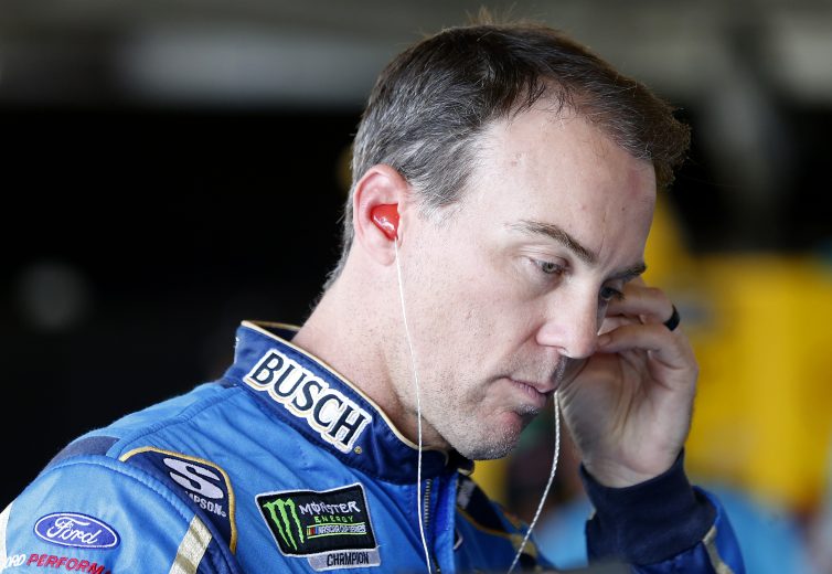 WATKINS GLEN, NEW YORK - AUGUST 03: Kevin Harvick, driver of the #4 Busch Beer Ford, stands in the garage area during practice for the Monster Energy NASCAR Cup Series Go Bowling at The Glen at Watkins Glen International on August 03, 2019 in Watkins Glen, New York. (Photo by Brian Lawdermilk/Getty Images) | Getty Images