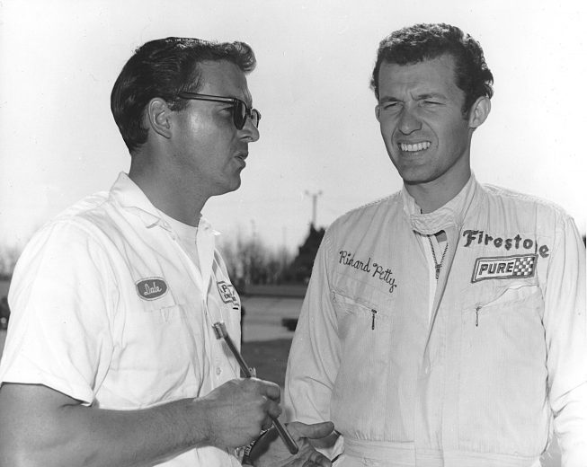 MACON, GA - JUNE 6, 1967: Crew chief Dale Inman (L) goes over a race plan with Richard Petty. The chat paid off, as they won the Macon 300. (Photo by ISC Archives/CQ-Roll Call Group via Getty Images)