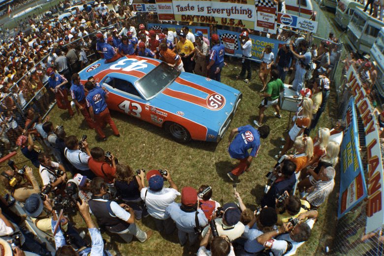 DAYTONA BEACH, FL -ÊJULY 4, 1975:  Richard Petty with his STP Dodge in victory lane after winning the Firecracker 400 NASCAR Cup race at Daytona International Speedway. (Photo by ISC Images & Archives via Getty Images)