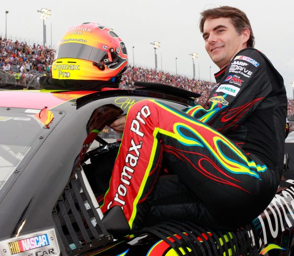 DARLINGTON, SC - MAY 11: Jeff Gordon, driver of the #24 Cromax Pro Chevrolet, climbs into his car during the NASCAR Sprint Cup Series Bojangles' Southern 500 at Darlington Raceway on May 11, 2013 in Darlington, South Carolina. (Photo by Geoff Burke/Getty Images) | Getty Images