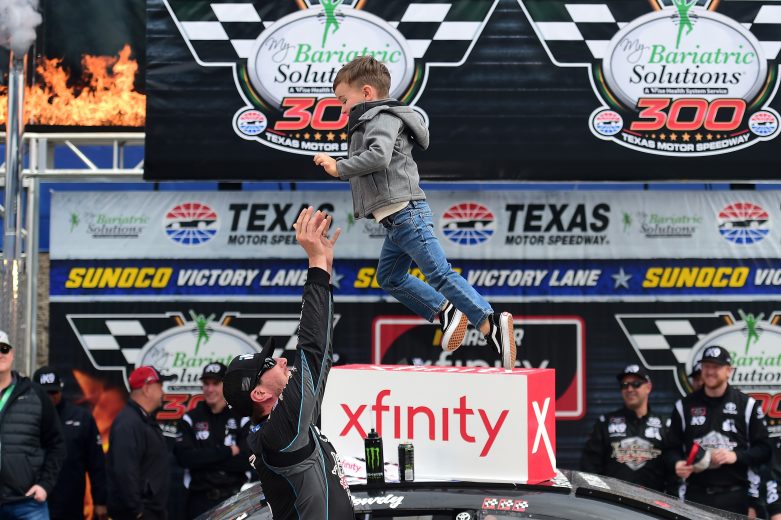 FORT WORTH, TX - MARCH 30: Kyle Busch, driver of the #18 iK9 Toyota, celebrates with his son Brexton in Victory Lane after winning the NASCAR Xfinity Series My Bariatric Solutions 300 at Texas Motor Speedway on March 30, 2019 in Fort Worth, Texas. (Photo by Jared C. Tilton/Getty Images) | Getty Images