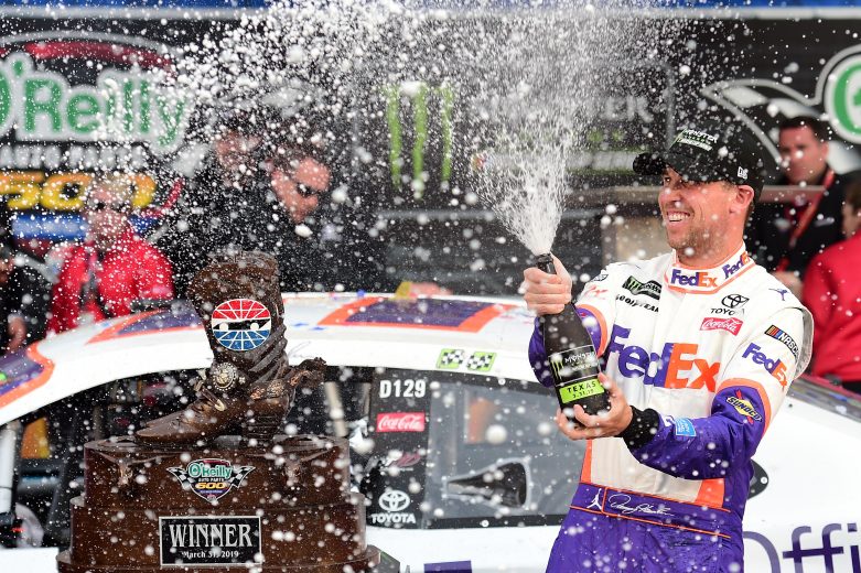 FORT WORTH, TX - MARCH 31:  Denny Hamlin, driver of the #11 FedEx Office Toyota, celebrates in Victory Lane after winning the Monster Energy NASCAR Cup Series O'Reilly Auto Parts 500 at Texas Motor Speedway on March 31, 2019 in Fort Worth, Texas.  (Photo by Jared C. Tilton/Getty Images) | Getty Images
