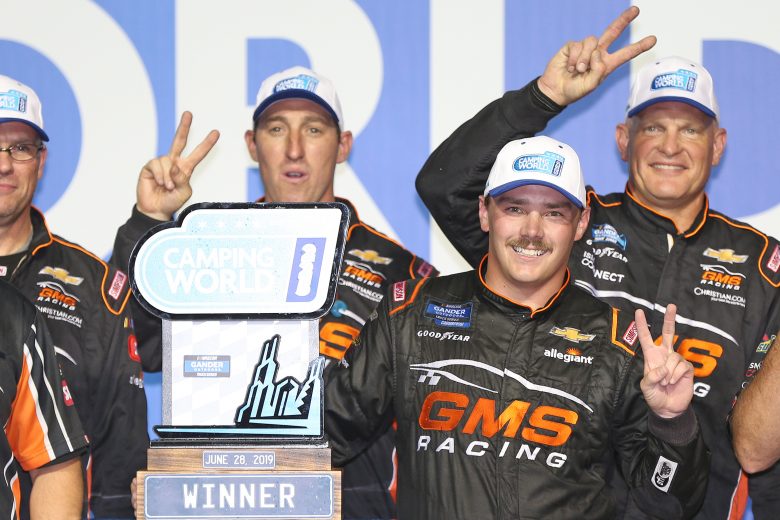 JOLIET, ILLINOIS - JUNE 28: Brett Moffitt, driver of the #24 GMS Chevrolet, poses with the trophy in Victory Lane after winning the NASCAR Gander Outdoors Truck Series Camping World 225 at Chicagoland Speedway on June 28, 2019 in Joliet, Illinois. (Photo by Matt Sullivan/Getty Images) | Getty Images