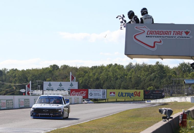 BOWMANVILLE, ON - AUGUST 25:  Brett Moffitt #24 driving the CMR Construction & Roofing Chevrolet wins the Chevrolet Silverado 250 Gander Nascar Outdoor Truck Series event at Canadian Tire Motorsport Park on August 25, 2019 in Bowmanville, Ontario, Canada. (Photo by Claus Andersen/Getty Images) | Getty Images