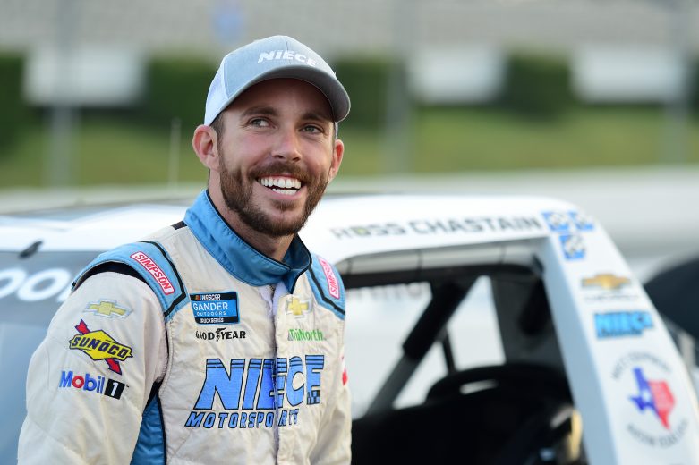 LONG POND, PENNSYLVANIA - JULY 26: Ross Chastain, driver of the #45 Niece/Acurlite Chevrolet, stands on the grid during qualifying for the NASCAR Gander Outdoors Truck Series Gander RV 150 at Pocono Raceway on July 26, 2019 in Long Pond, Pennsylvania. (Photo by Jared C. Tilton/Getty Images) | Getty Images