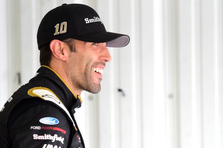 LONG POND, PENNSYLVANIA - JULY 27: Aric Almirola, driver of the #10 Smithfield Ford, stands in the garage area during practice for the Monster Energy NASCAR Cup Series Gander RV 400 at Pocono Raceway on July 27, 2019 in Long Pond, Pennsylvania. (Photo by Jared C. Tilton/Getty Images) | Getty Images