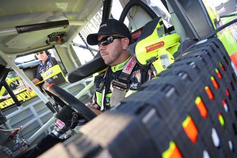 ROSSBURG, OHIO - AUGUST 01: Matt Crafton, driver of the #88 IdealDoor/Menards Ford, sits in his truck during a qualifying race for the NASCAR Gander Outdoor Truck Series Eldora Dirt Derby at Eldora Speedway on August 01, 2019 in Rossburg, Ohio. (Photo by Matt Sullivan/Getty Images) | Getty Images