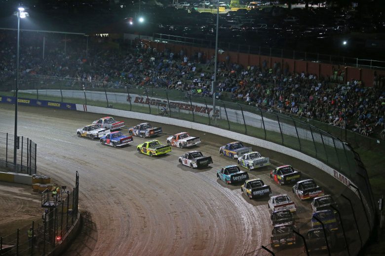 ROSSBURG, OHIO - AUGUST 01: Chase Briscoe, driver of the #27 DiaEdge Ford, leads a pack of trucks during the NASCAR Gander Outdoor Truck Series Eldora Dirt Derby at Eldora Speedway on August 01, 2019 in Rossburg, Ohio. (Photo by Matt Sullivan/Getty Images) | Getty Images
