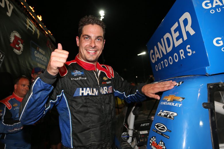 ROSSBURG, OHIO - AUGUST 01: Stewart Friesen, driver of the #52 Halmar International Chevrolet, applies the winner's sticker after the NASCAR Gander Outdoor Truck Series Eldora Dirt Derby at Eldora Speedway on August 01, 2019 in Rossburg, Ohio. (Photo by Matt Sullivan/Getty Images) | Getty Images